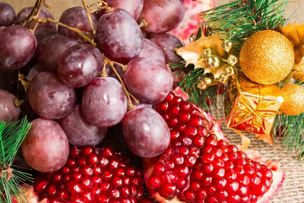 Frutas podem também ajudar na decoração do jantar de Natal.